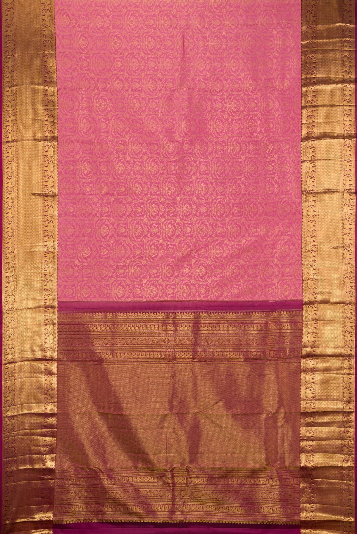 Flat view of Pure Silk Rose pink Kanjivaram Saree with Zari Brocade on the body and Zari Border. 