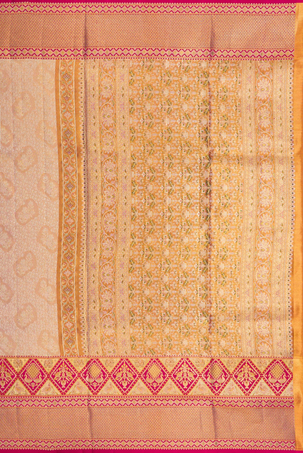 Close up image of the pallu of Rose Gold Dual Tone Kanchipuram Tissue Saree with Zari Brocade on the body and Fancy Border. 