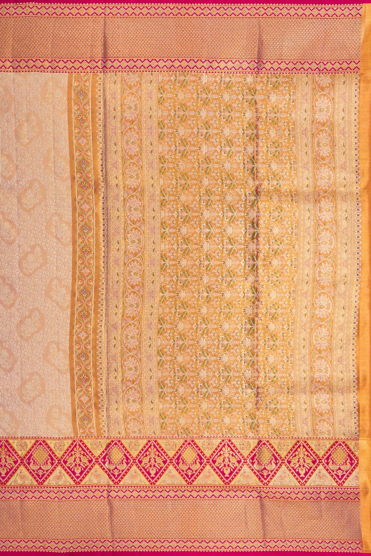 Close up image of the pallu of Rose Gold Dual Tone Kanchipuram Tissue Saree with Zari Brocade on the body and Fancy Border. 