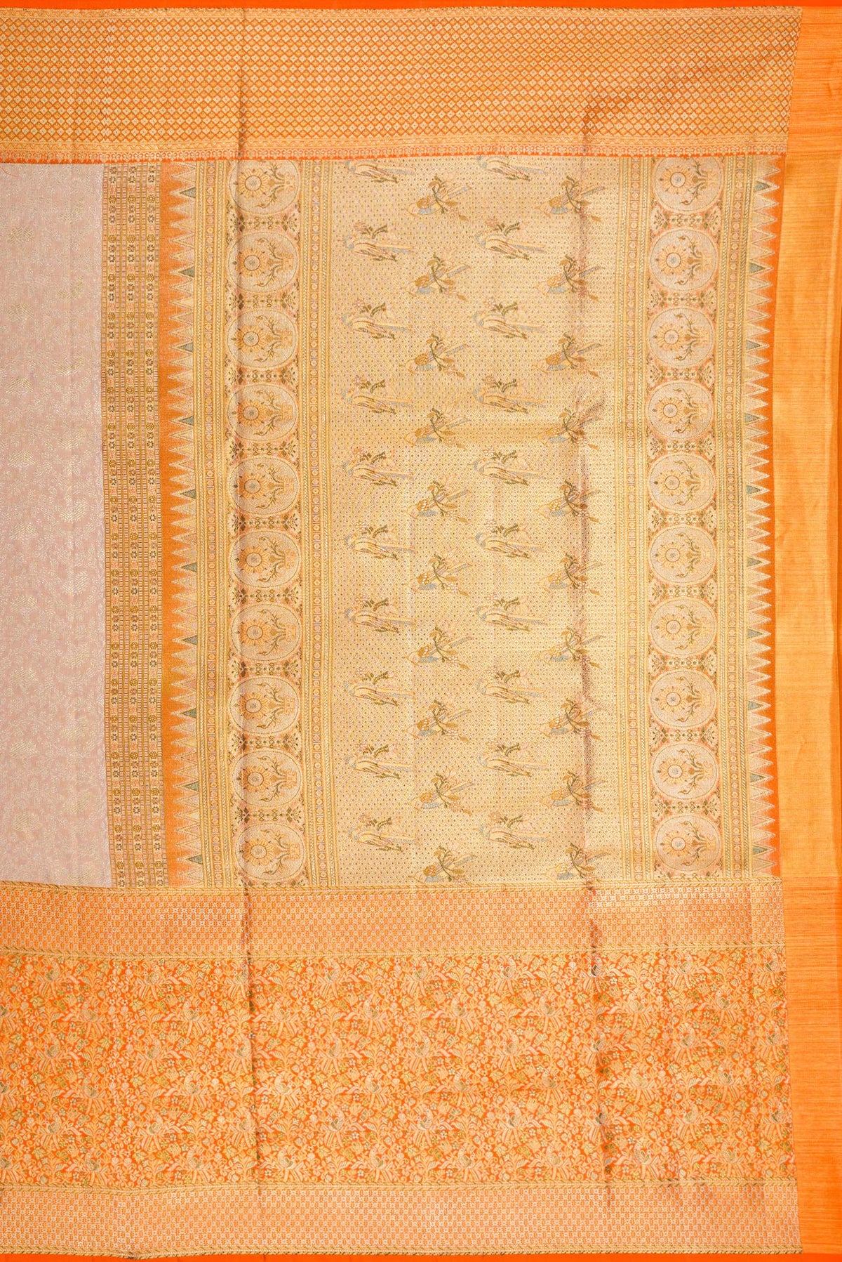 Close up image of the pallu of Rose Gold Dual Tone Kanchipuram Tissue Saree with Zari Brocade on the body and Fancy Border. 