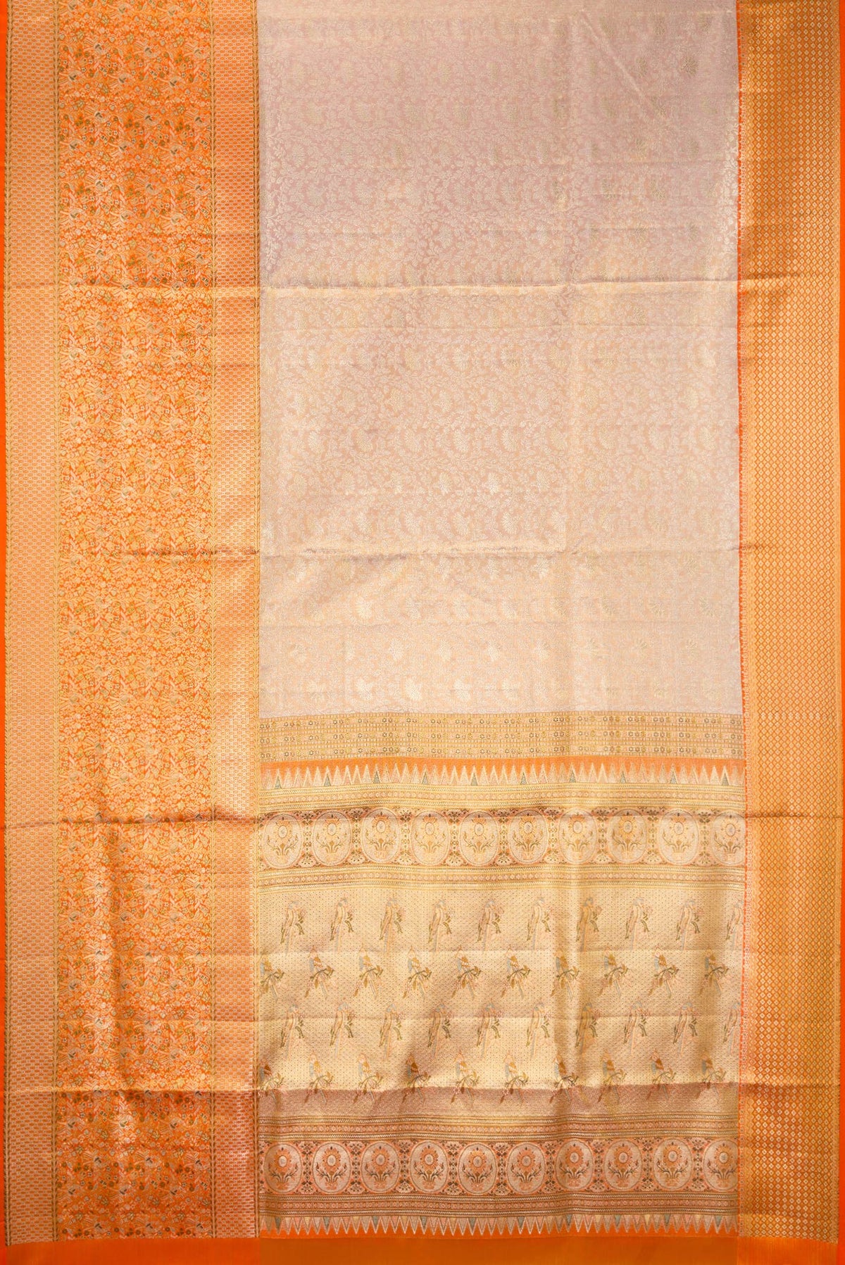 Flat view of Rose Gold Dual Tone Kanchipuram Tissue Saree with Zari Brocade on the body and Fancy Border. 