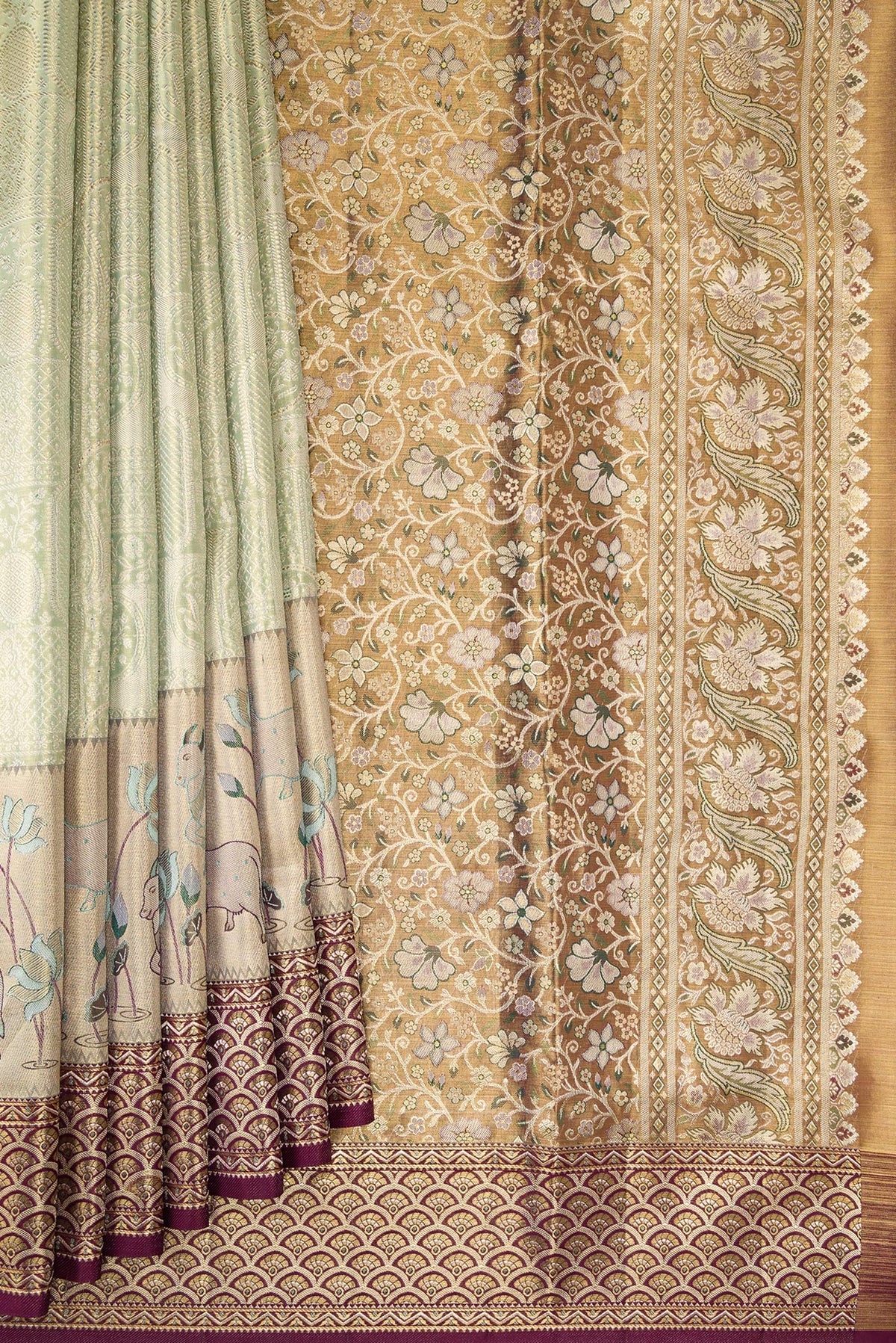 Pleats and pallu of Pista Green Dual Tone Kanchipuram Tissue Saree with Zari Brocade on the body and Fancy Border. 
