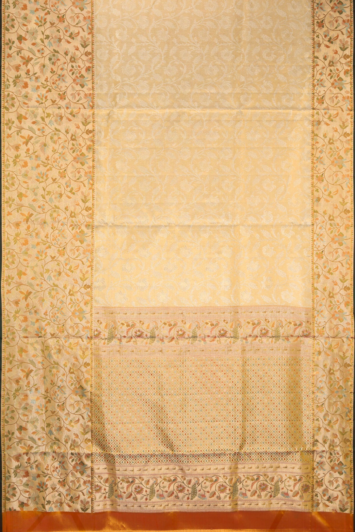 Flat view of Gold Dual Tone Kanchipuram Tissue Saree with Zari Brocade on the body and Fancy Border. 