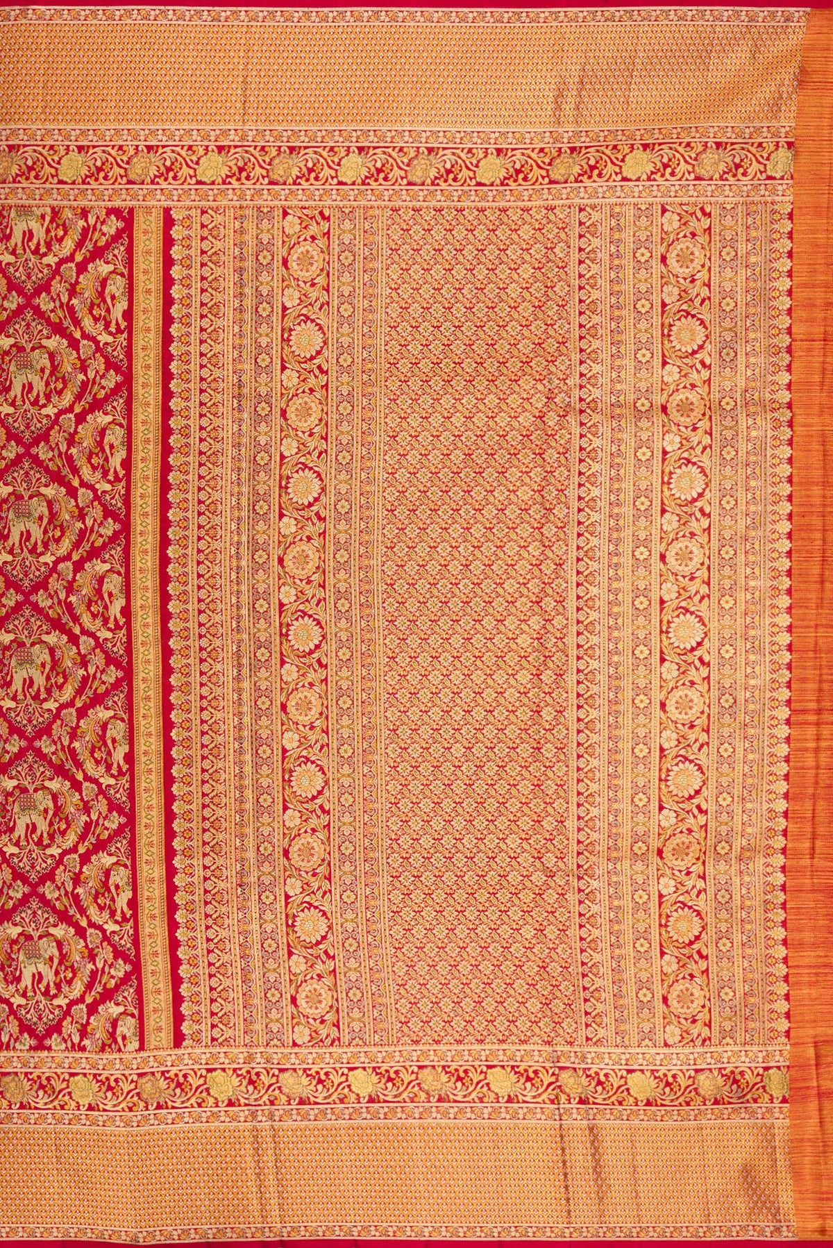 Close up image of the pallu of Deep Red Dual Tone Kanchipuram Tissue Saree with Zari Brocade on the body and Fancy Border. 