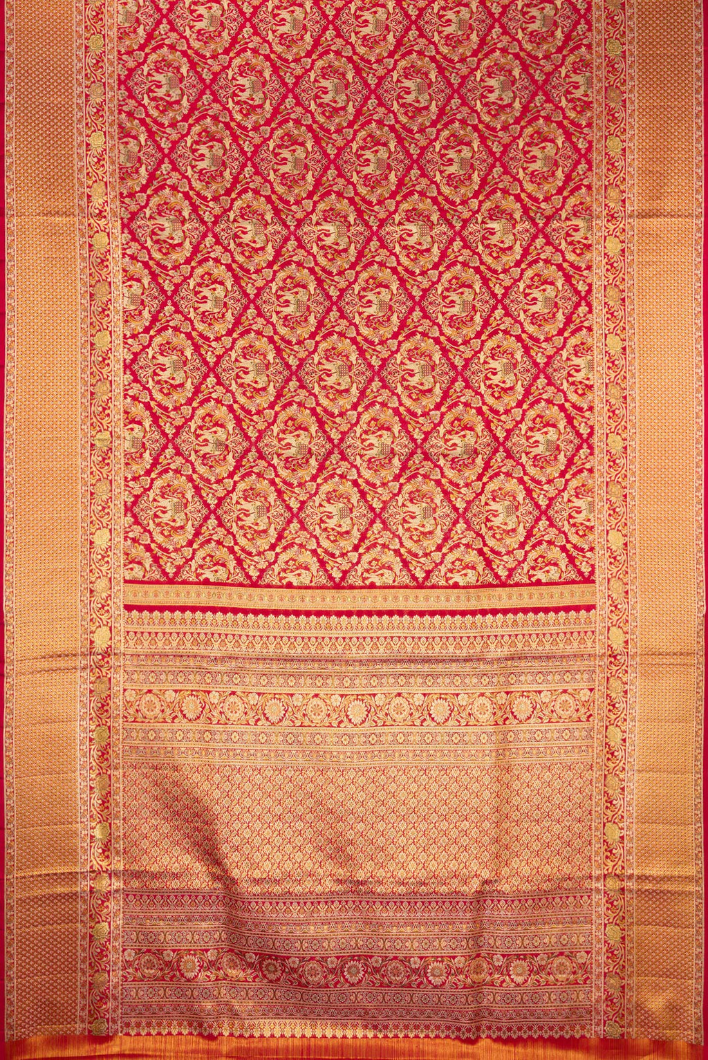 Flat view of Deep Red Dual Tone Kanchipuram Tissue Saree with Zari Brocade on the body and Fancy Border. 