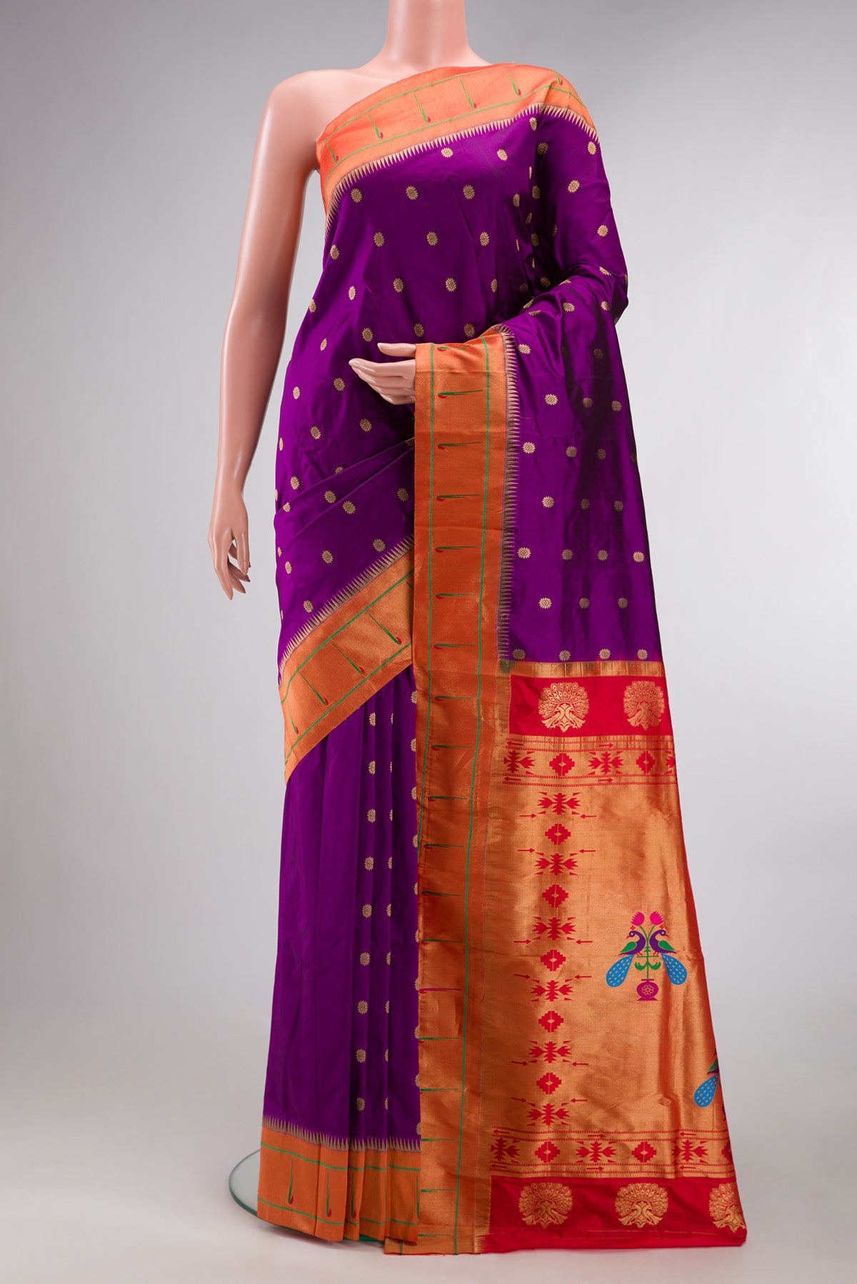 Pure Silk Purple Paithani Saree with Zari Butta on the body and Paithani Border.  displayed on a mannequin