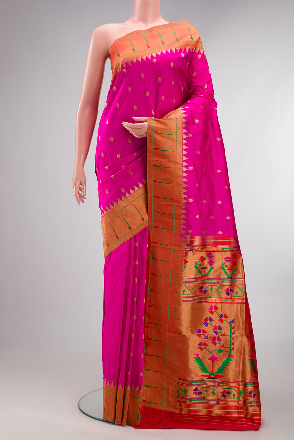 Pure Silk Pink Paithani Saree with Zari Butta on the body and Paithani Border.  displayed on a mannequin