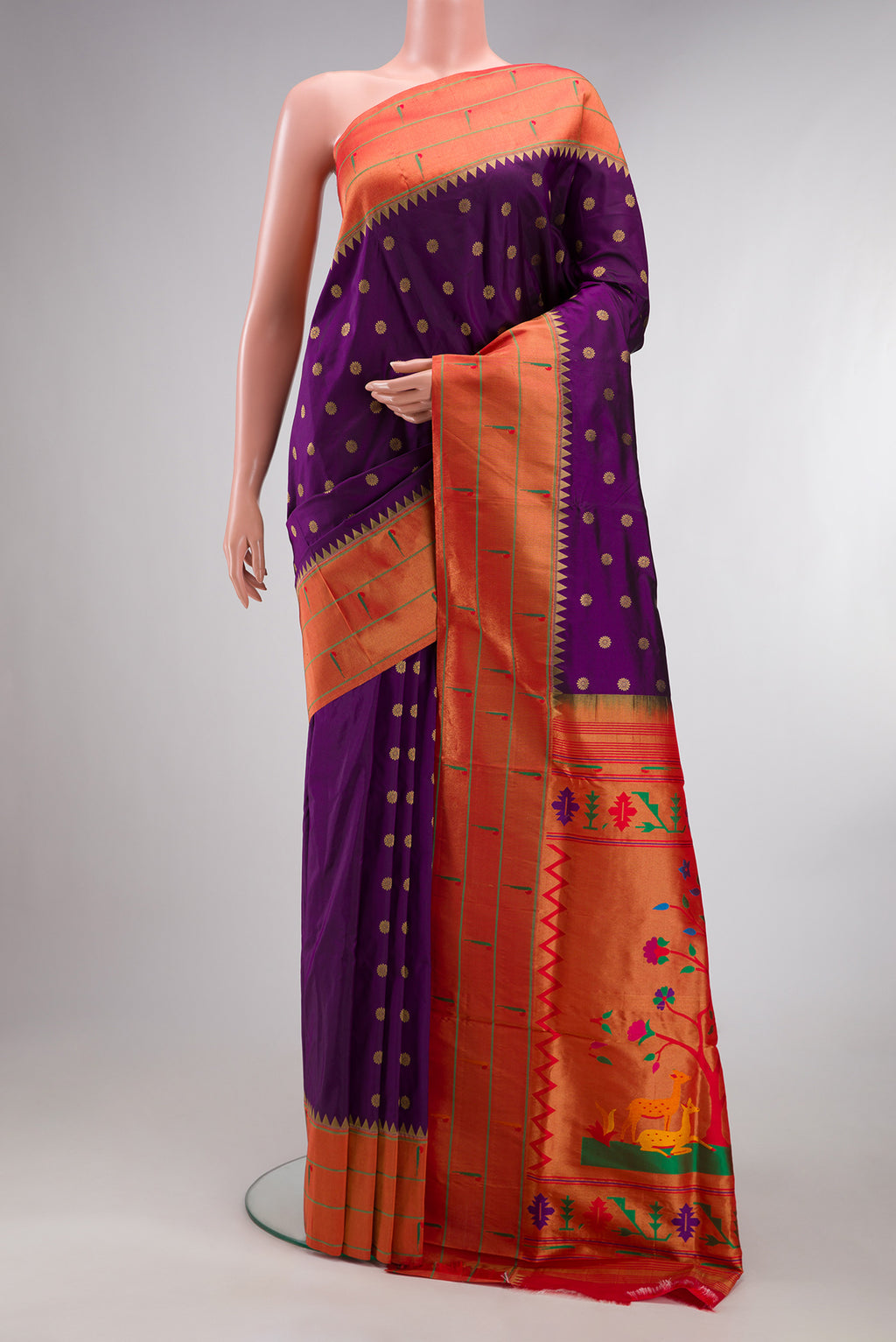 Pure Silk Violet Paithani Saree with Zari Butta on the body and Paithani Border.  displayed on a mannequin