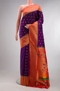 Pure Silk Violet Paithani Saree with Zari Butta on the body and Paithani Border.  displayed on a mannequin