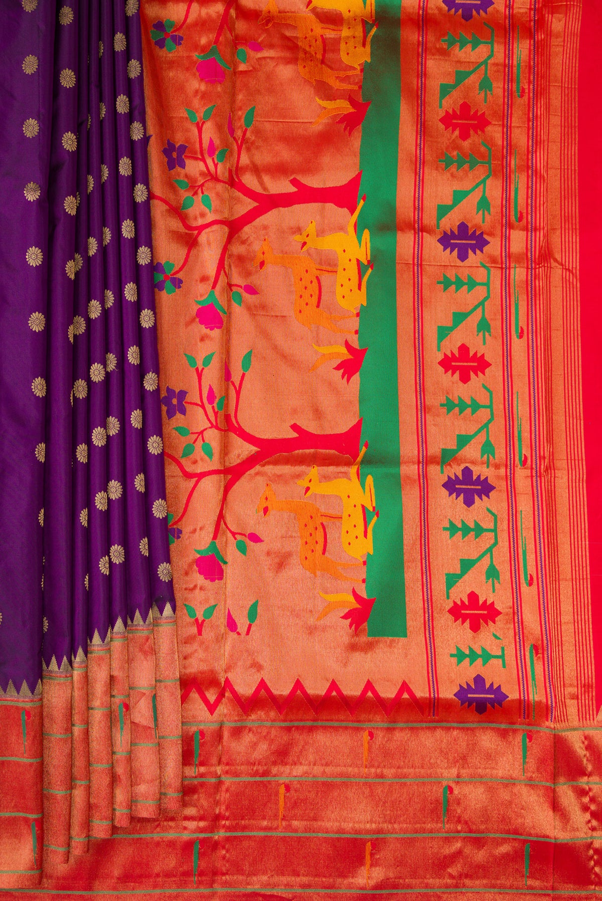 Pleats and pallu of Pure Silk Violet Paithani Saree with Zari Butta on the body and Paithani Border. 