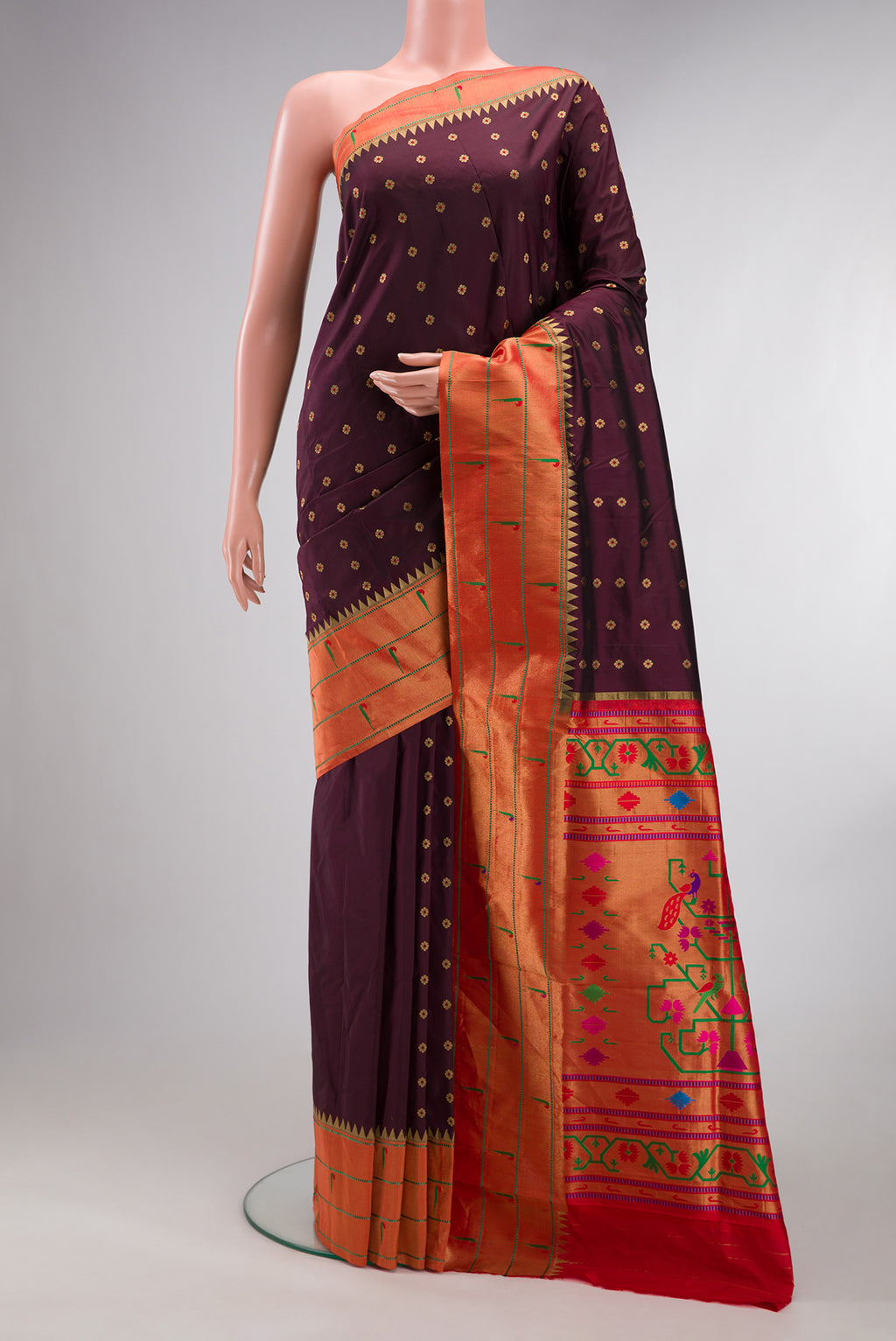 Pure Silk Coffee Brown Paithani Saree with Zari And Thread Butta on the body and Paithani Border.  displayed on a mannequin