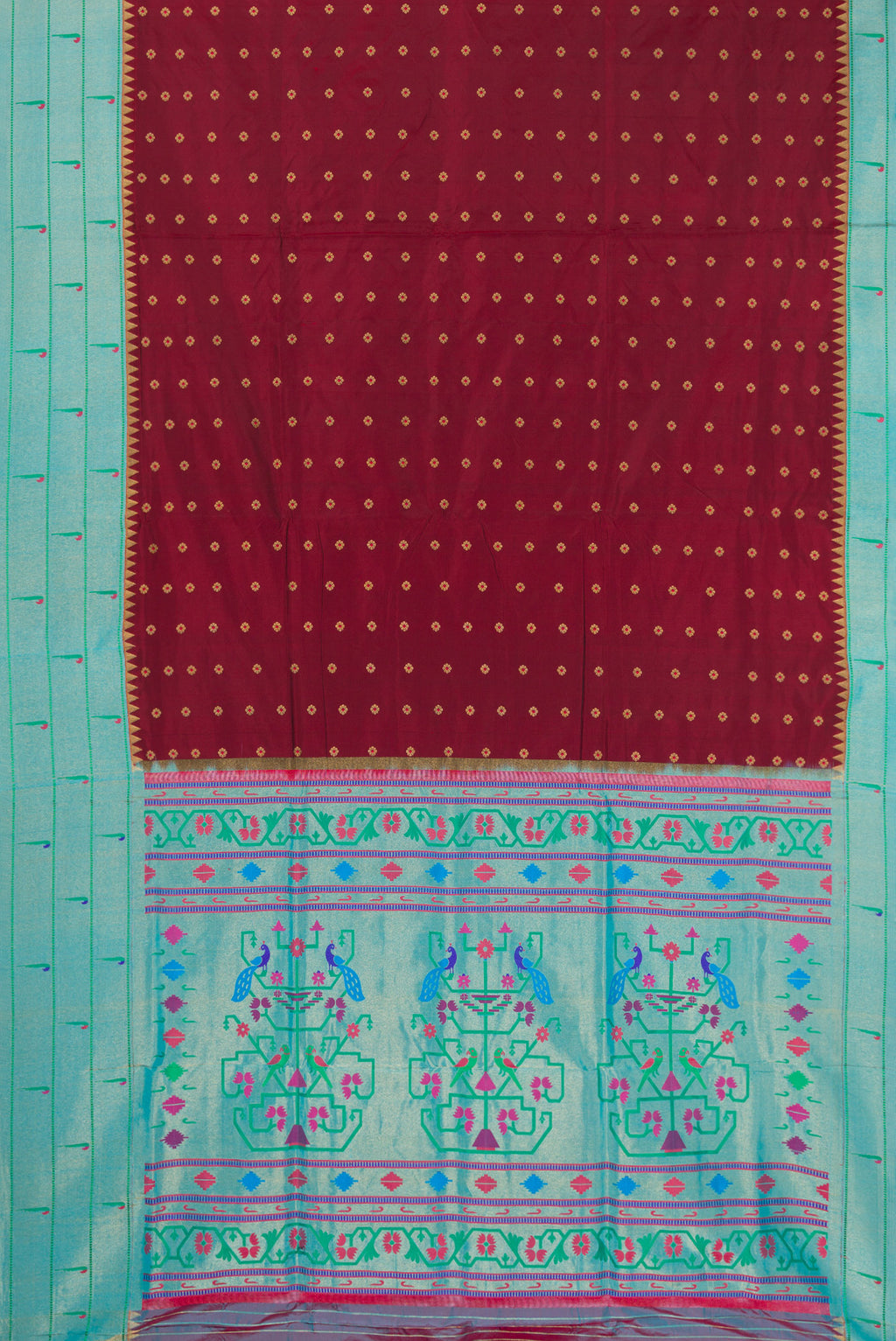 Flat view of Pure Silk Maroon Paithani Saree with Zari And Thread Butta on the body and Paithani Border. 