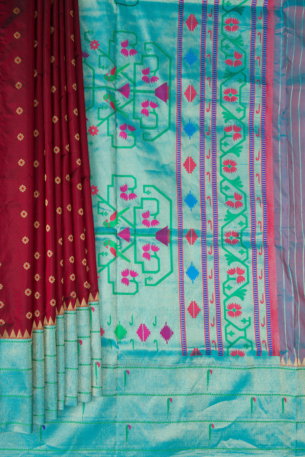 Pleats and pallu of Pure Silk Maroon Paithani Saree with Zari And Thread Butta on the body and Paithani Border. 