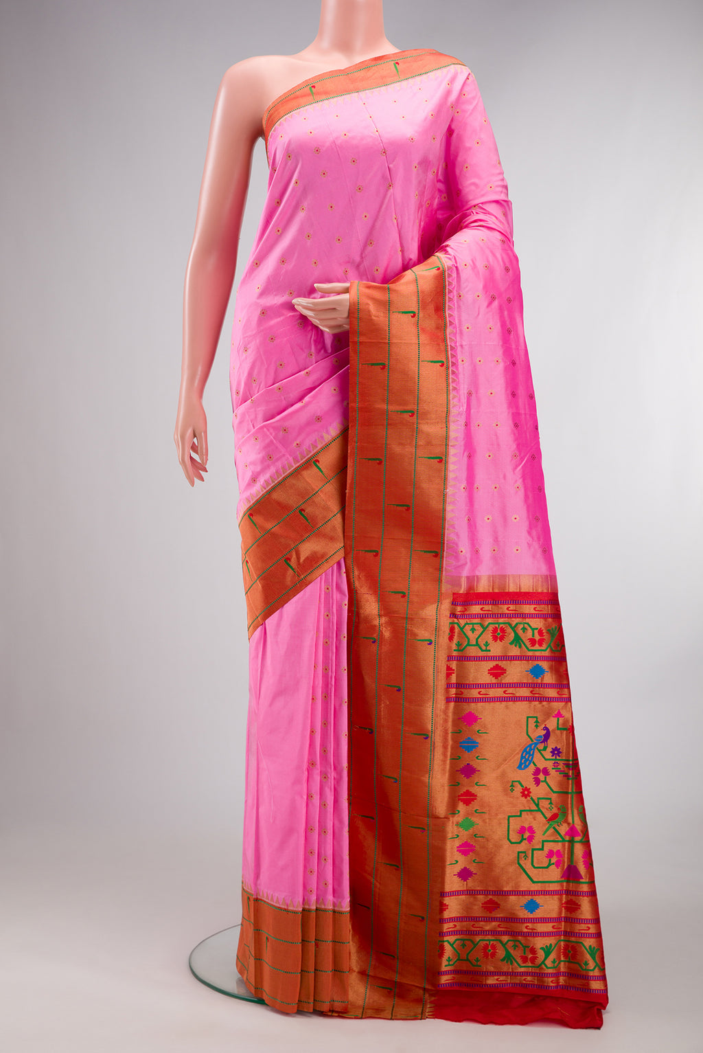 Pure Silk Rose pink Paithani Saree with Zari And Thread Butta on the body and Paithani Border.  displayed on a mannequin