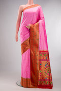 Pure Silk Rose pink Paithani Saree with Zari And Thread Butta on the body and Paithani Border.  displayed on a mannequin