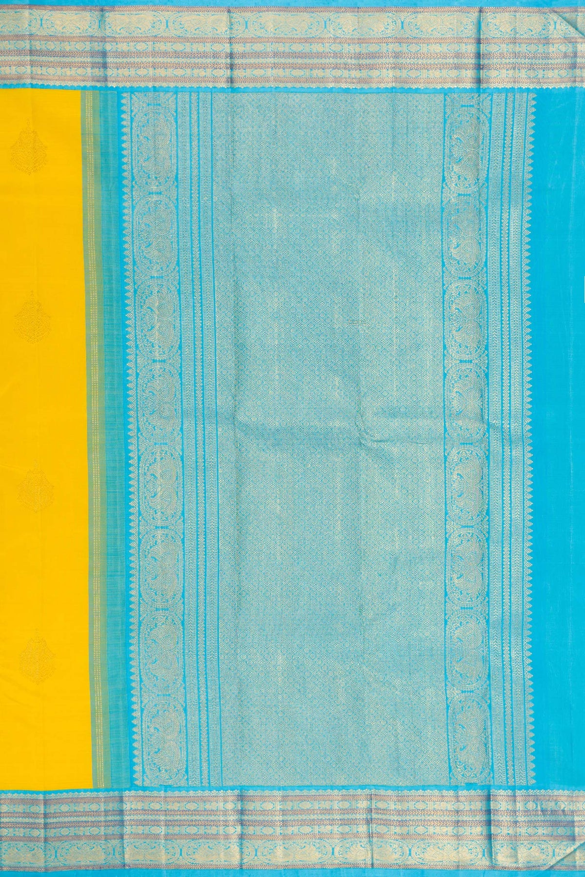 Close up image of the pallu of Pure Silk Yellow Kanjivaram Saree with Zari Butta on the body and Zari Border. 