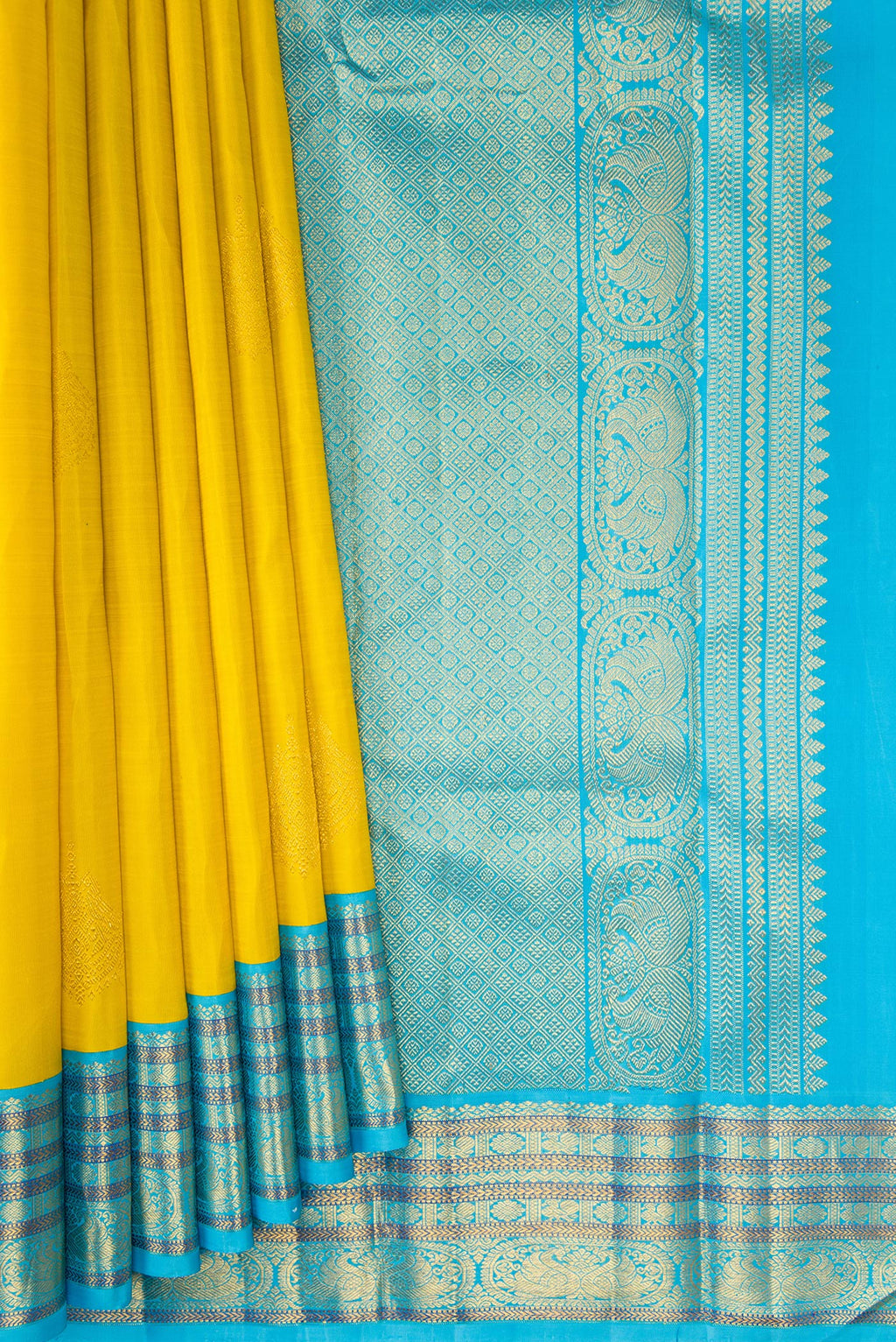 Pleats and pallu of Pure Silk Yellow Kanjivaram Saree with Zari Butta on the body and Zari Border. 
