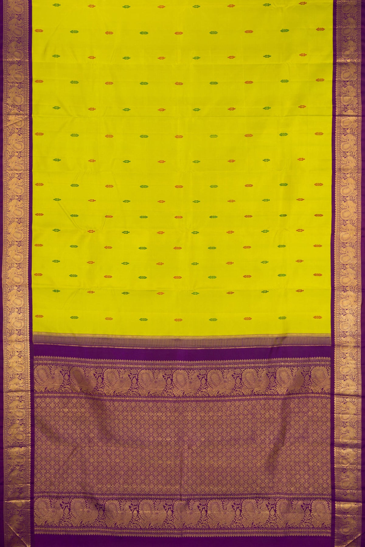 Flat view of Pure Silk Green Dual Tone Kanjivaram Saree with Thread Butta on the body and Zari Border. 