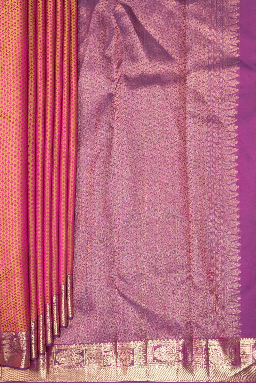 Pleats and pallu of Pure Silk Pure Zari Pinkish Yellow Dual Tone Kanchipuram Saree with Jacquard design on the body and Zari Border. 