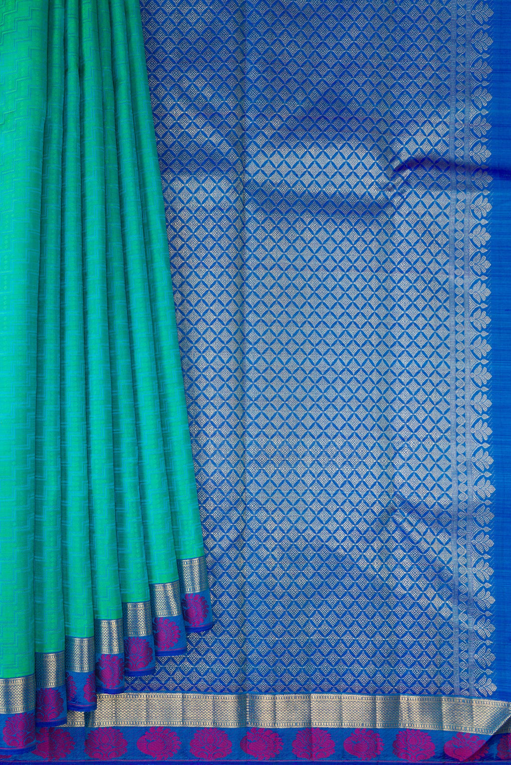 Pleats and pallu of Pure Silk Sea Green Kanchipuram Saree with Jacquard design on the body and Fancy Border. 