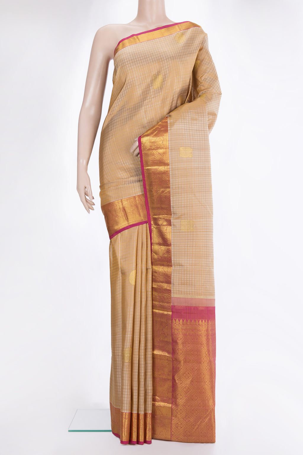 Pure Silk Beige Dual Tone Kanchipuram Saree with Checked design on the body and Zari Border.  displayed on a mannequin