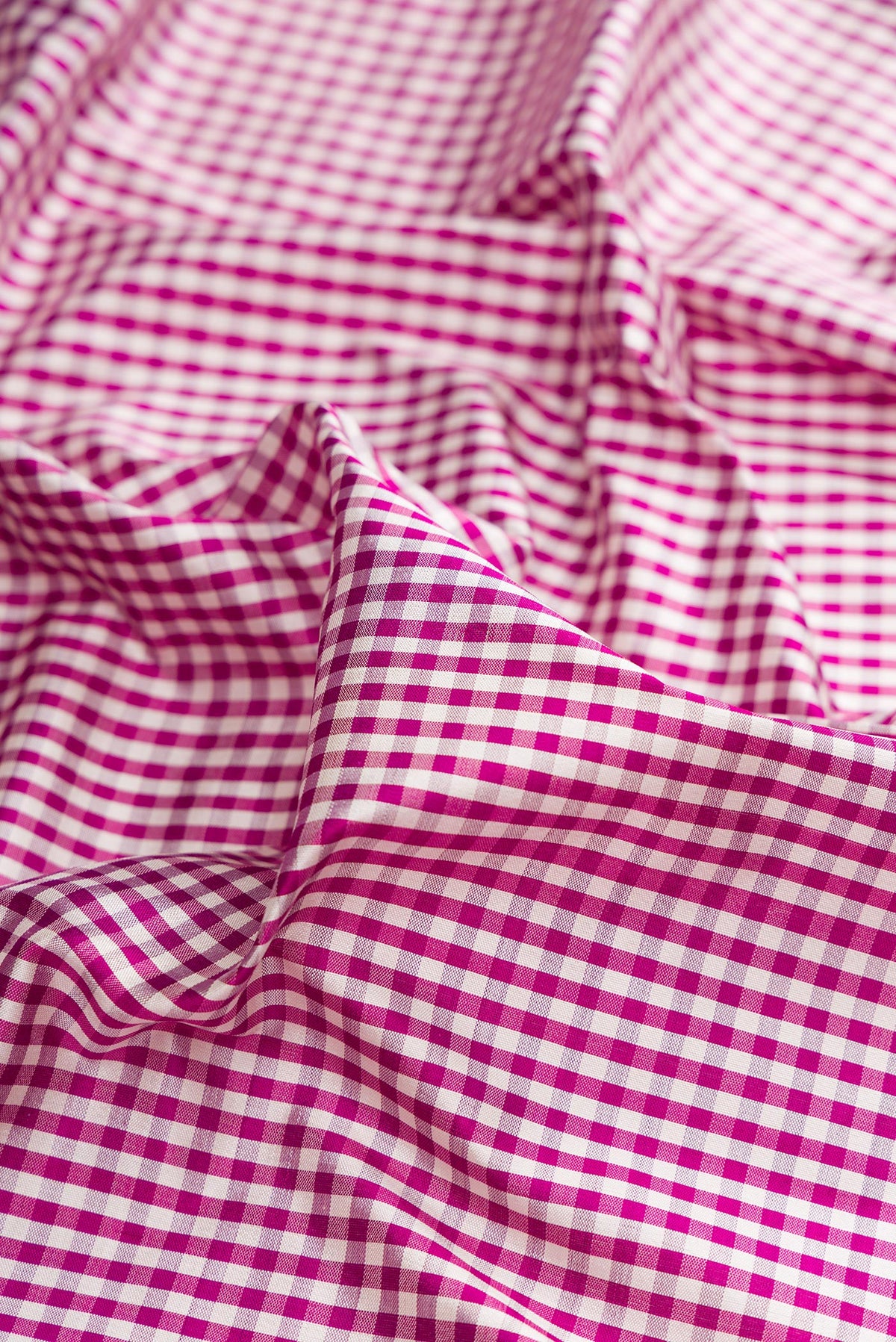 Close up of Pure Silk Multi Color Pochampally Saree with Checked design on the body and Temple Border.  displaying folds