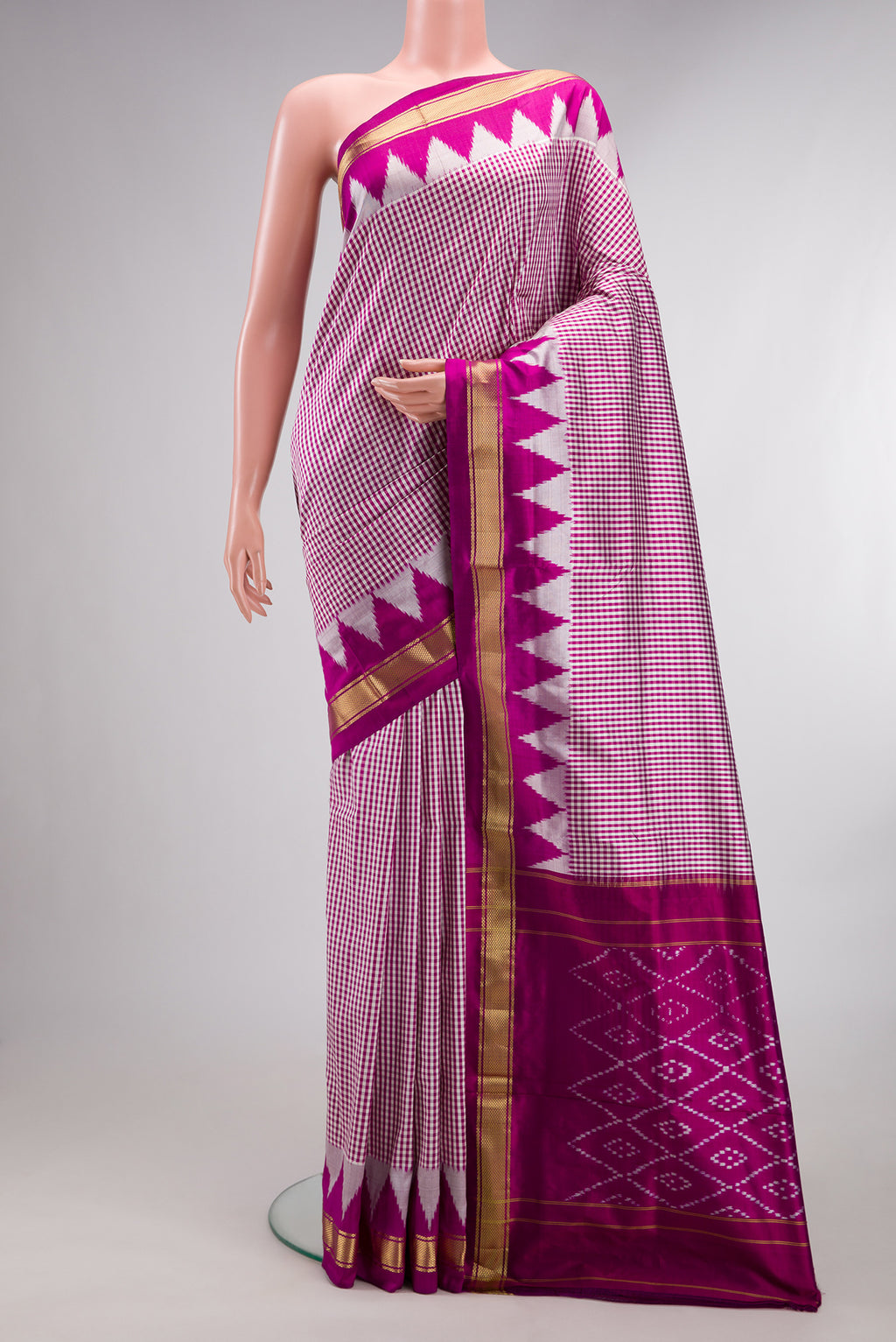 Pure Silk Multi Color Pochampally Saree with Checked design on the body and Temple Border.  displayed on a mannequin