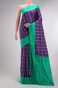 Pure Silk Purple Pochampally Saree with Checked design on the body and Zari Border.  displayed on a mannequin