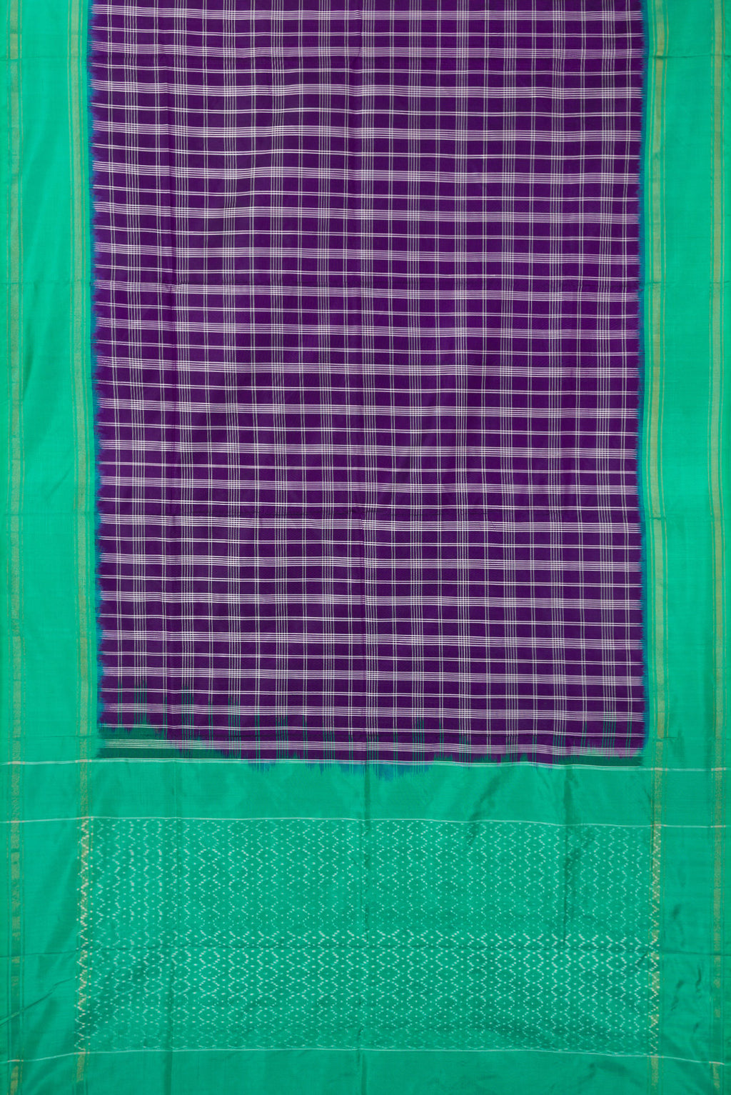 Flat view of Pure Silk Purple Pochampally Saree with Checked design on the body and Zari Border. 