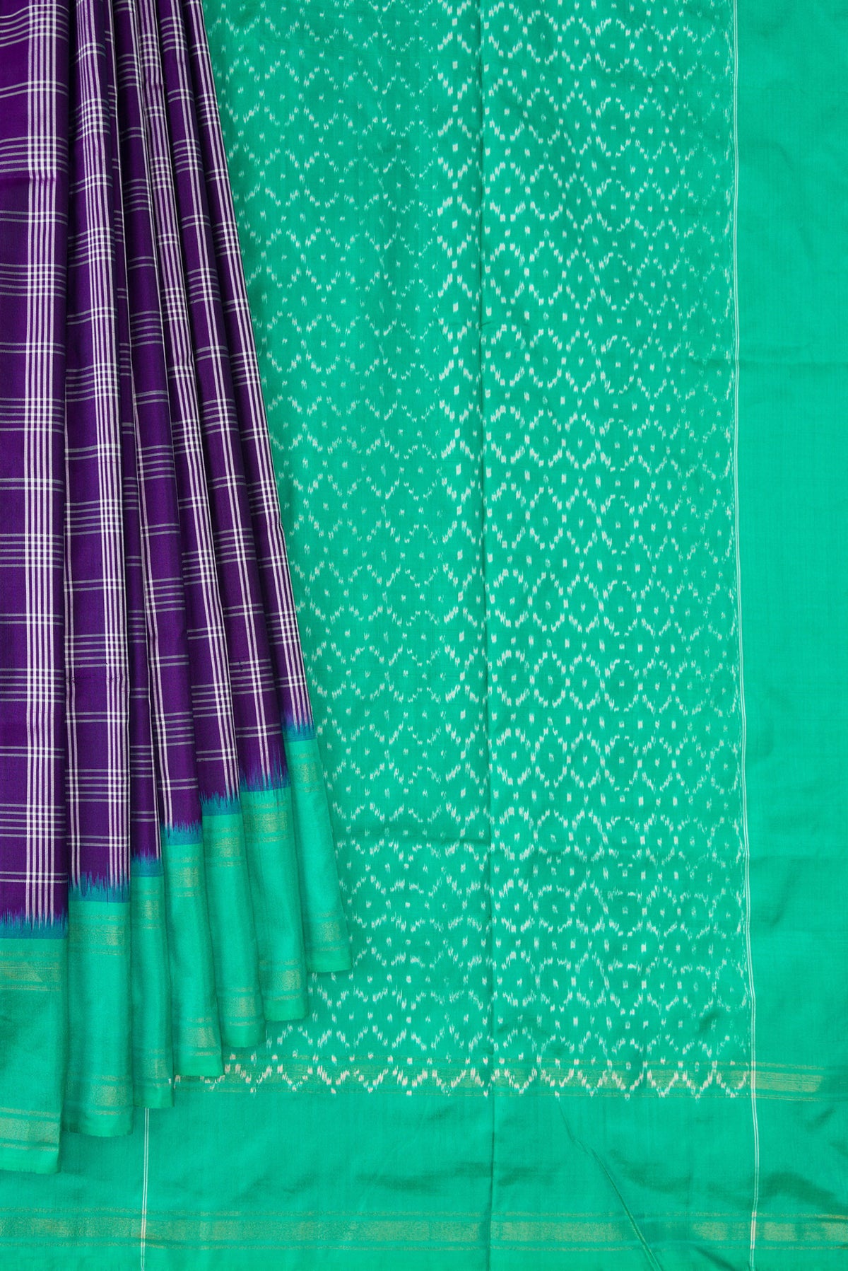 Pleats and pallu of Pure Silk Purple Pochampally Saree with Checked design on the body and Zari Border. 