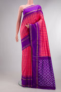 Pure Silk Coral Pochampally Saree with Checked design on the body and Temple Border.  displayed on a mannequin