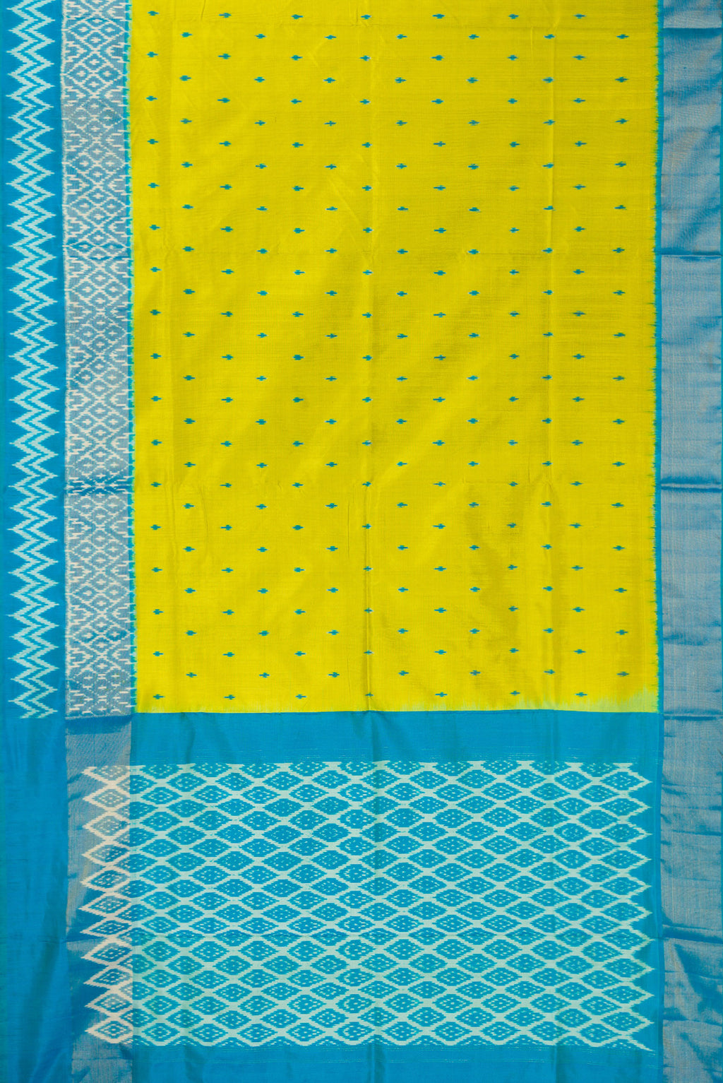 Flat view of Pure Silk Parrot Green Pochampally Saree with Pure Ikat on the body and Ikat Border. 