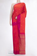 Pure Silk Coral Dual Tone Kanjivaram Saree with Zari Butta on the body and Plain Border.  displayed on a mannequin