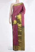 Pure Silk Coral Kanjivaram Saree with Zari Butta on the body and Zari Border.  displayed on a mannequin