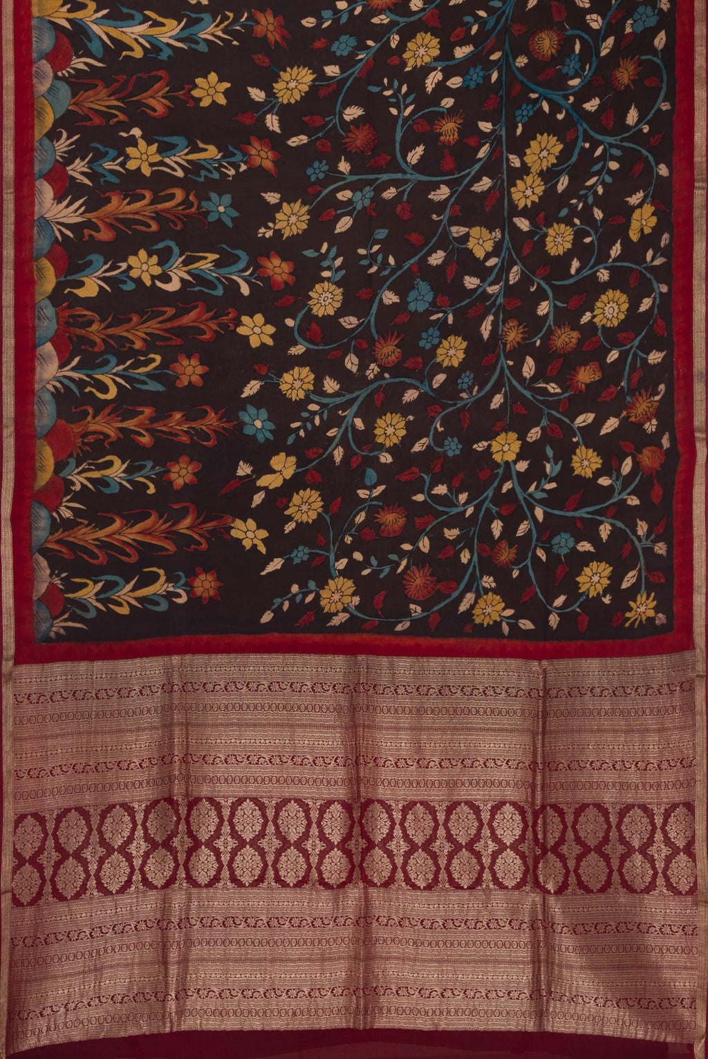 Flat view of Brown Mysore Chiffon Saree with kalamkari Print on the body and Zari Border. 