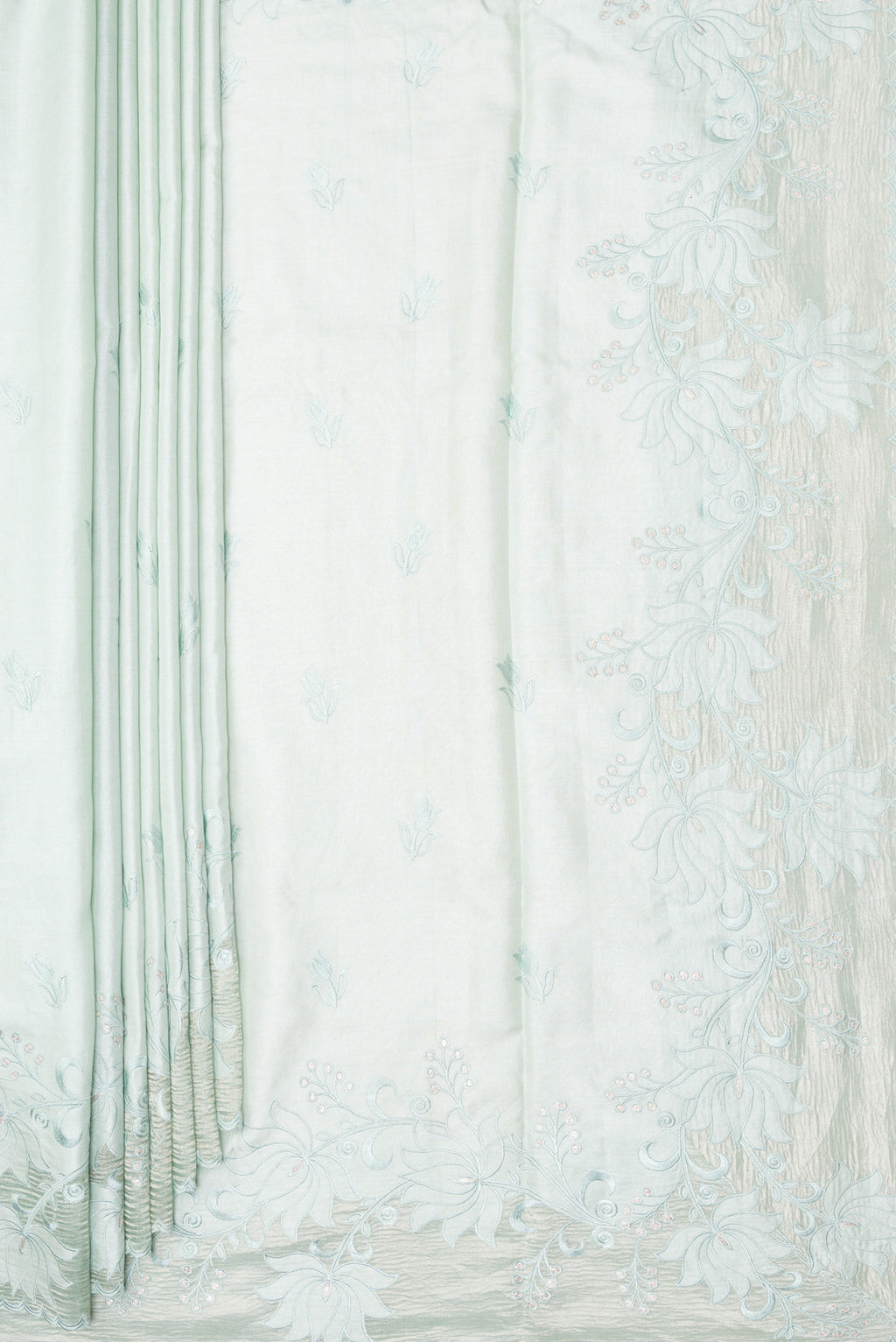 Pleats and pallu of Pure Silk Mint Green Dual Tone Tussar Saree with Embroidery on the body and Embroidery Border. 