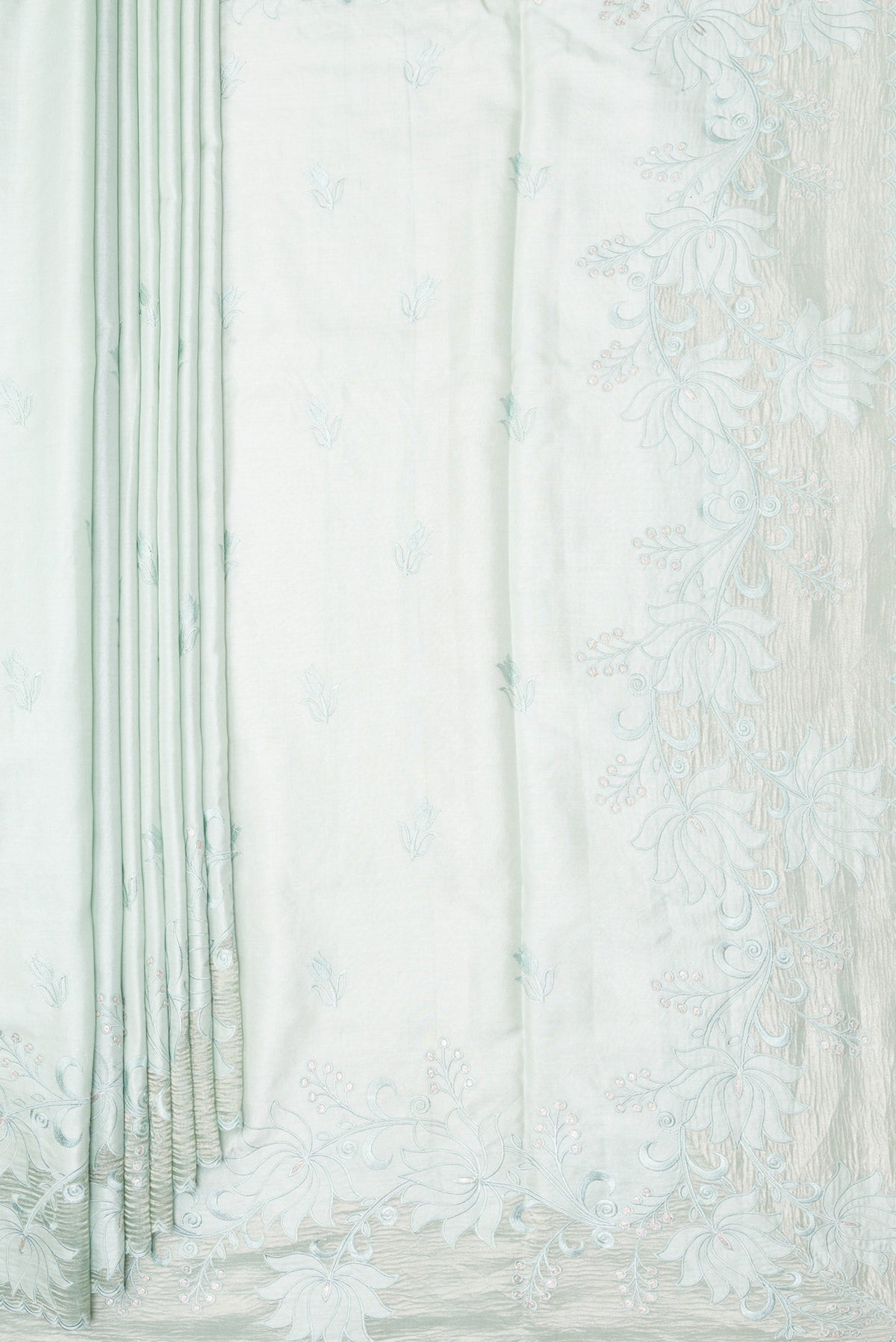 Pleats and pallu of Pure Silk Mint Green Dual Tone Tussar Saree with Embroidery on the body and Embroidery Border. 