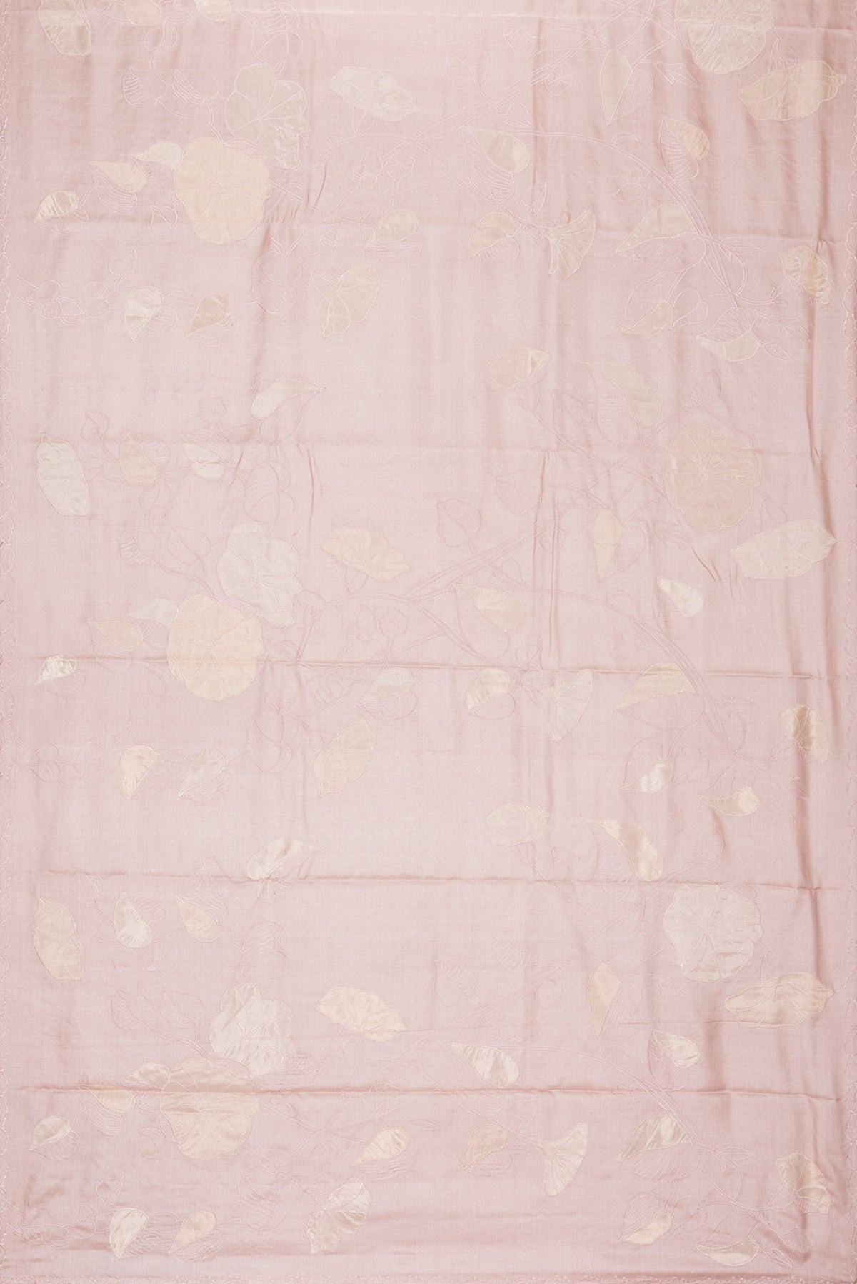 Flat view of Rose Gold Tussar Saree with Embroidery on the body and Embroidery Border. 