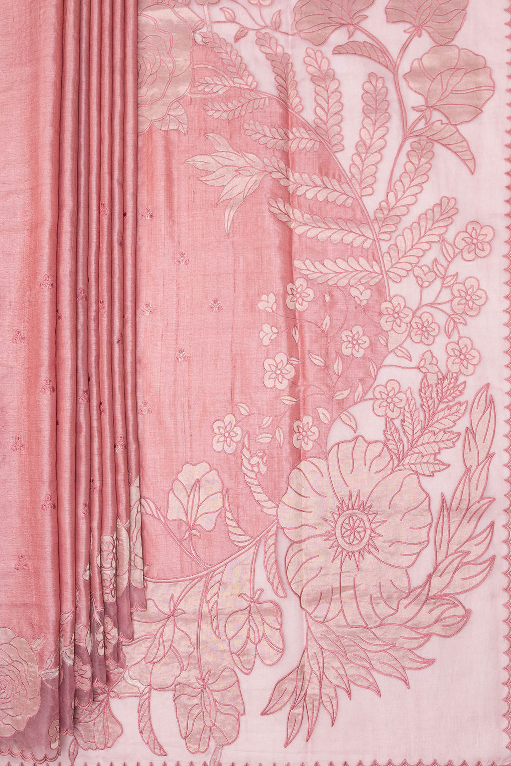 Pleats and pallu of Peach Tussar Saree with Embroidery on the body and Embroidery Border. 