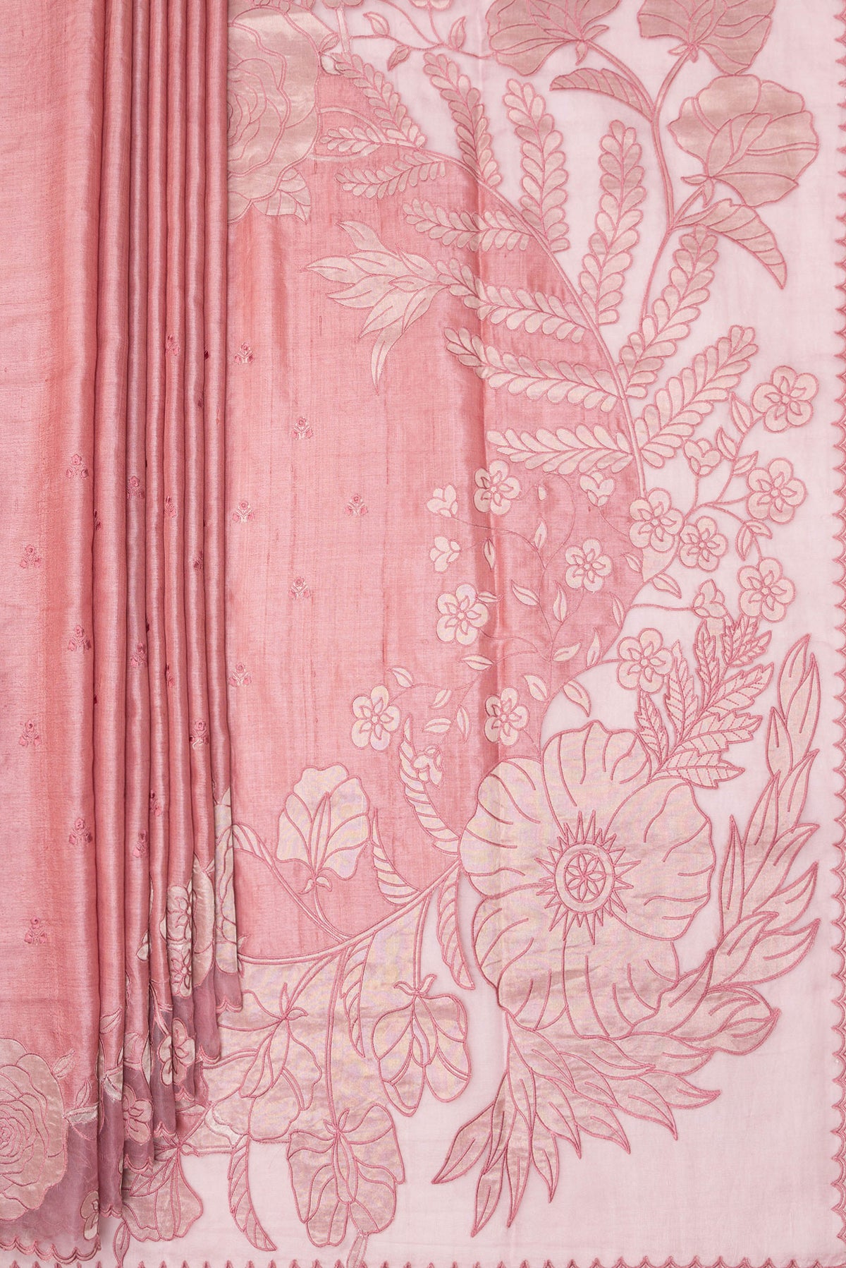 Pleats and pallu of Peach Tussar Saree with Embroidery on the body and Embroidery Border. 