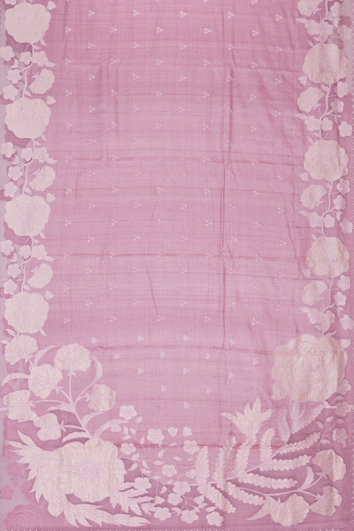 Flat view of Rose Gold Tussar Saree with Embroidery on the body and Embroidery Border. 