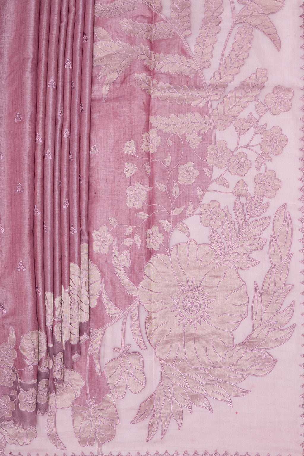 Pleats and pallu of Rose Gold Tussar Saree with Embroidery on the body and Embroidery Border. 