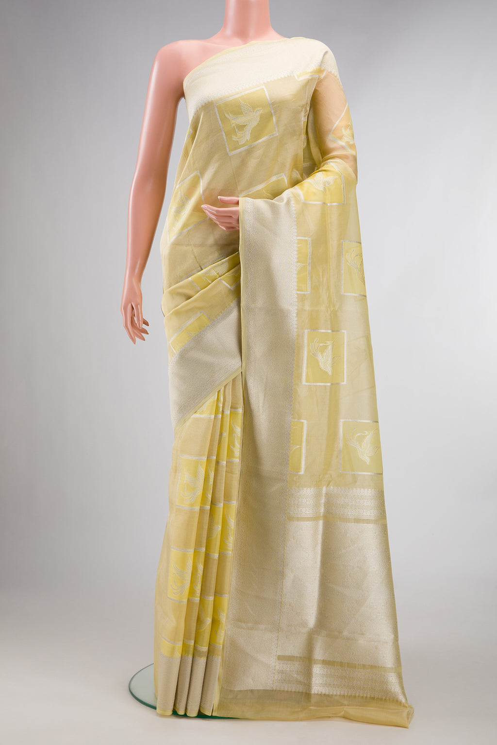 Sandal Dual Tone Banarasi Kora Saree with Zari Brocade on the body and Zari Border.  displayed on a mannequin