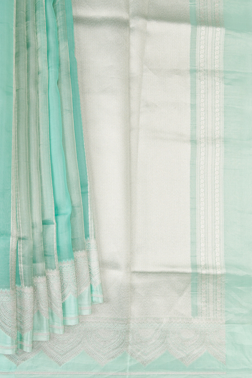 Pleats and pallu of Turquoise Dual Tone Banarasi Kora Saree with Stripes on the body and Zari Border. 