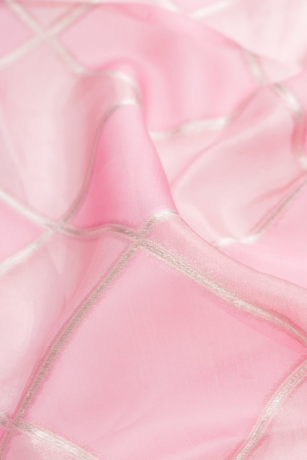 Close up of Pink Dual Tone Banarasi Kora Saree with Zari Brocade on the body and Zari Border.  displaying folds