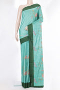 Sea Green Tussar Saree with Embroidery on the body and Embroidery Border.  displayed on a mannequin