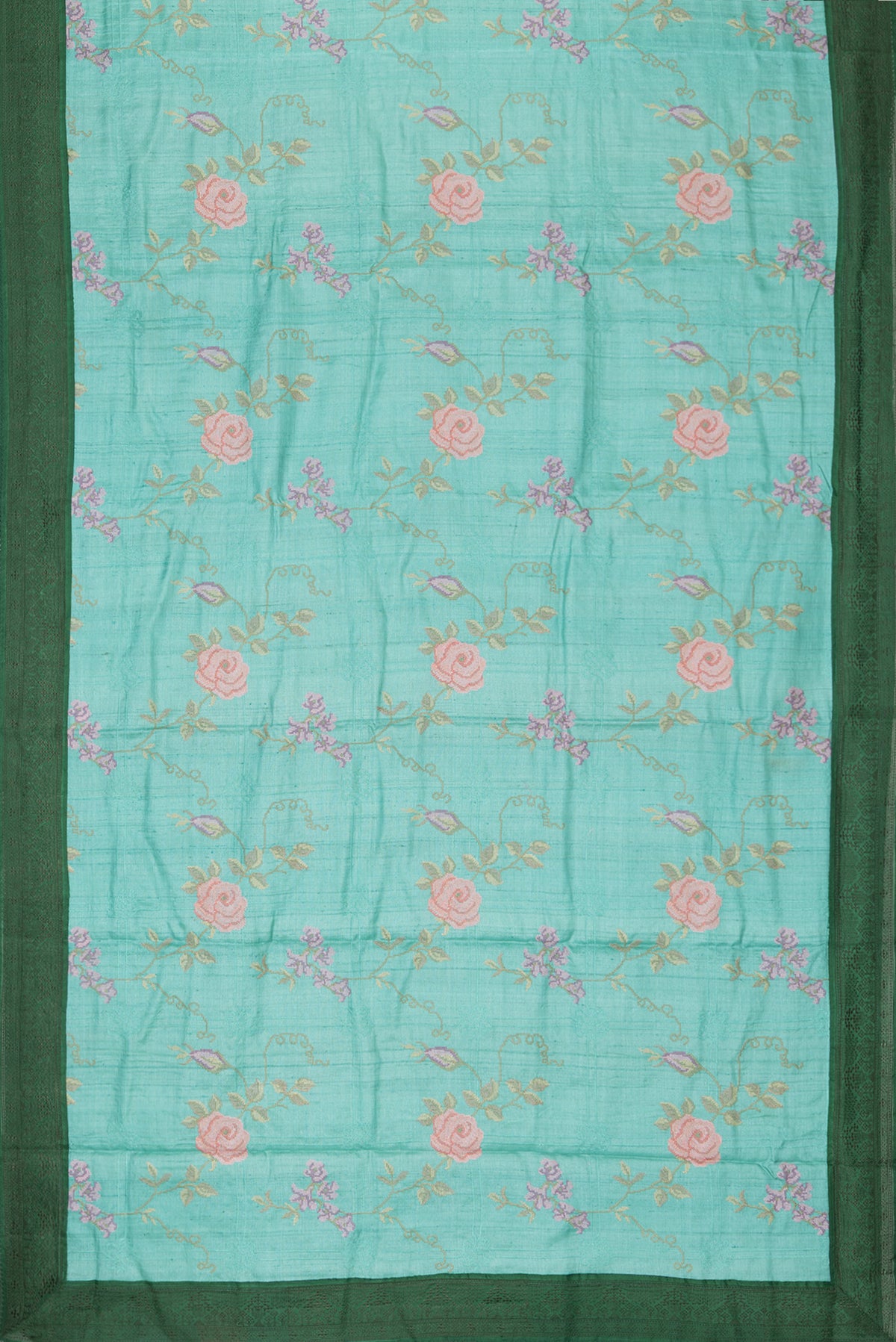 Flat view of Sea Green Tussar Saree with Embroidery on the body and Embroidery Border. 