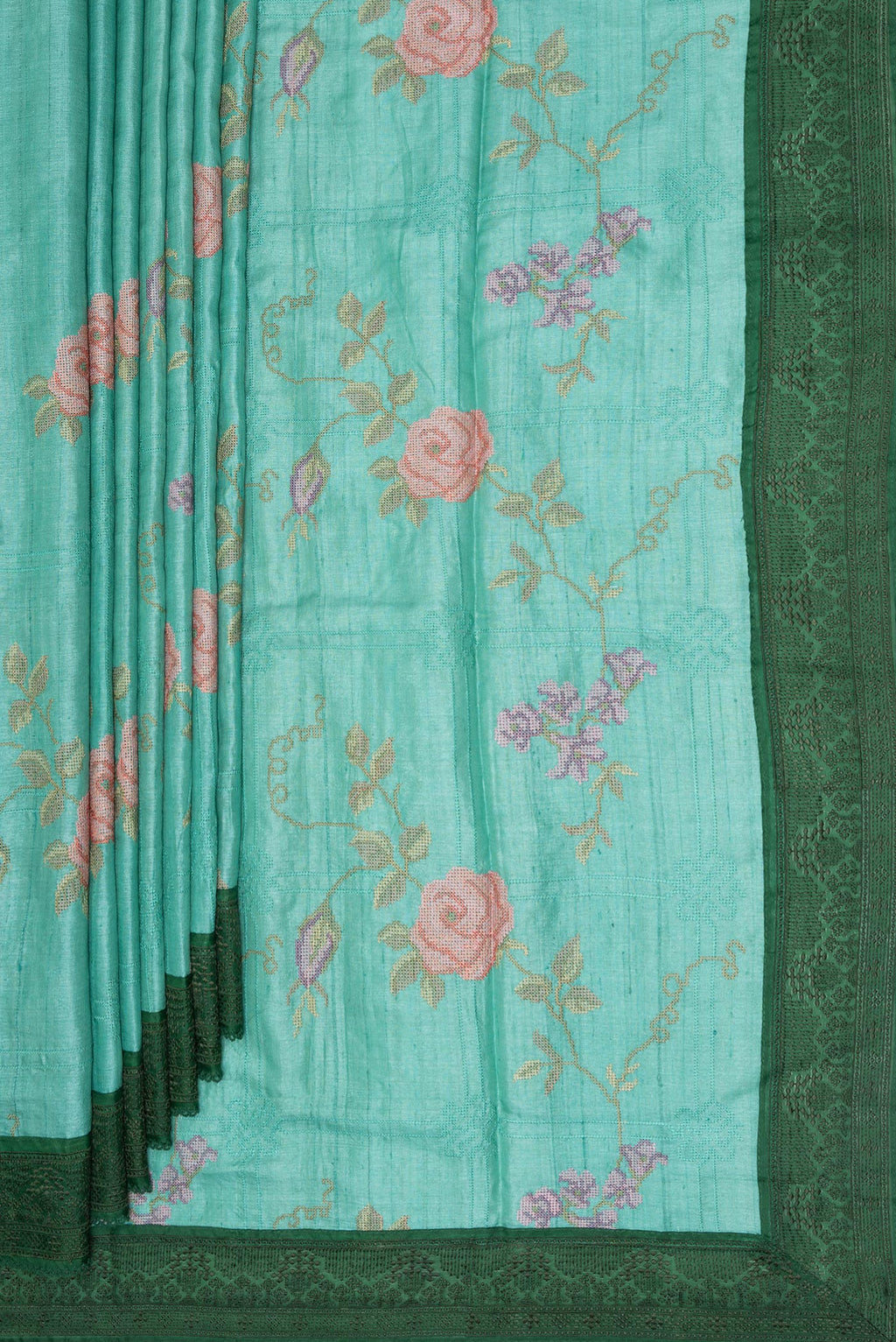 Pleats and pallu of Sea Green Tussar Saree with Embroidery on the body and Embroidery Border. 