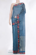 Peacock Blue Tussar Saree with Checked design on the body and Embroidery Border.  displayed on a mannequin