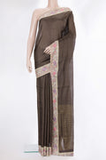 Brown Dual Tone Tussar Saree with Checked design on the body and Embroidery Border.  displayed on a mannequin